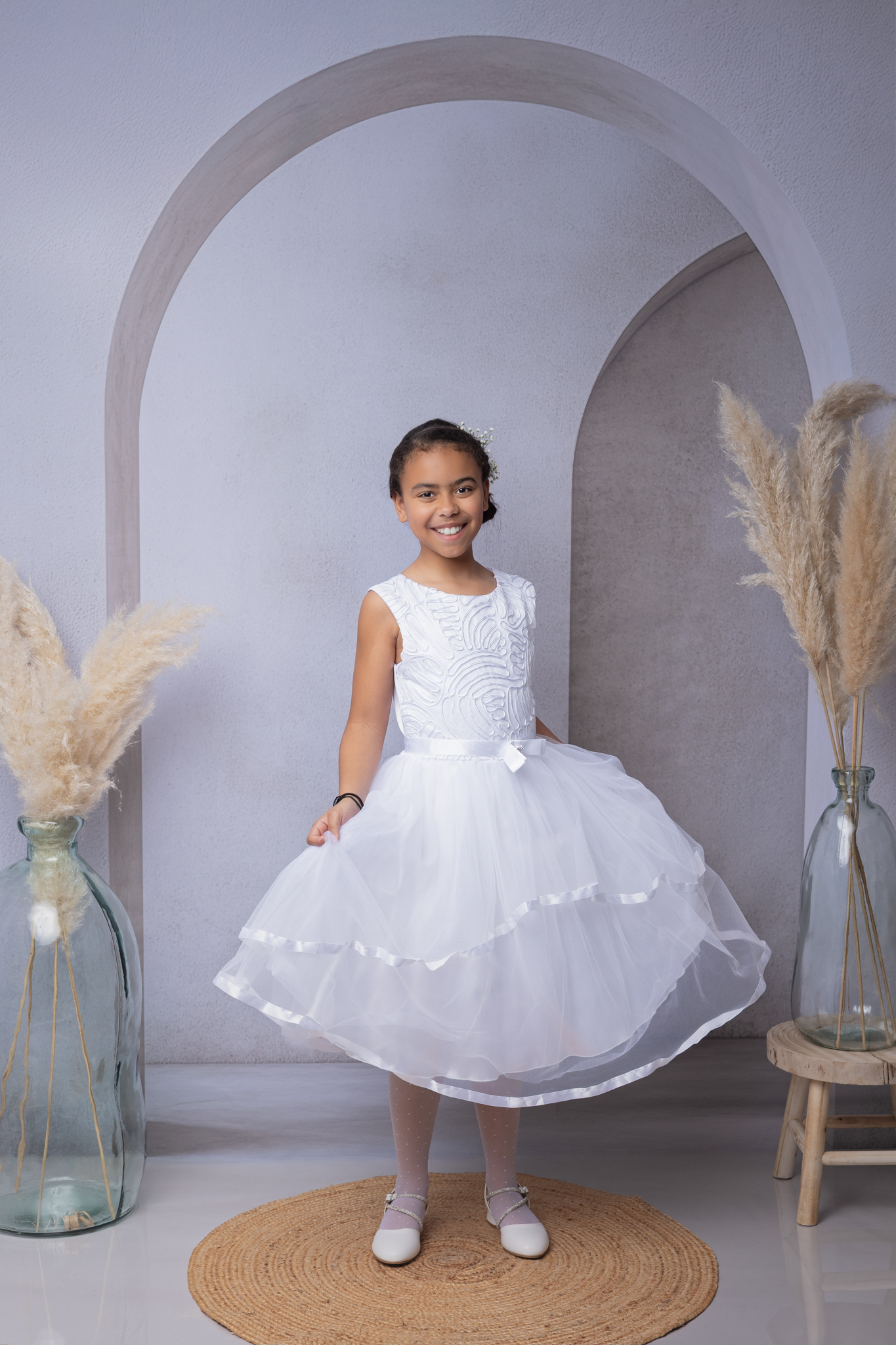 photo de communion en studio dans une arcade